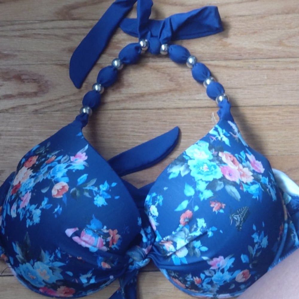 Gently used padded swim top floral print